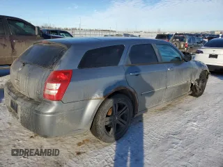2006 Dodge Magnum R/T z VIN 2D4GV57256H187683, wystawiony jako Copart lot #87879585 z przebiegiem 260 895 mil mil oraz Szkody całkowita. Historia ofert i sprzedaży dostępna na DreamBid. Obrazek 3.