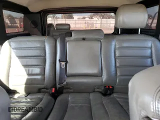 2005 Hummer H2 SUV with VIN 5GRGN23U85H113194, listed as a Copart auction lot 78012304 with 148,940 mi miles and Salvage Title. Bid and sale history available at carsss.com. Image 10.