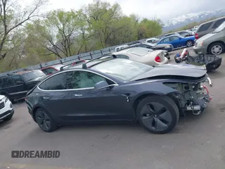 2020 Tesla Model 3 Long Range with VIN 5YJ3E1EB1LF639055, listed as a IAAI auction lot 42048009 with 43,493 mi miles. Bid and sale history available at carsss.com. Image 13.