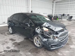 2017 Ford Fiesta SE z VIN 3FADP4BJ3HM129360, wystawiony jako IAAI lot #42242344 z przebiegiem 66 057 mil mil oraz . Historia ofert i sprzedaży dostępna na DreamBid. Obrazek 1.