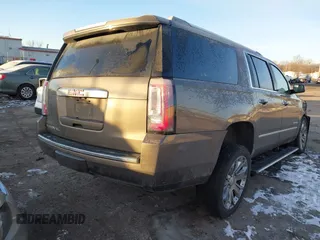 2016 GMC Yukon XL Denali with VIN 1GKS2HKJ8GR432174, listed as a IAAI auction lot 41411844 with 187,258 mi miles and . Bid and sale history available at carsss.com. Image 3.