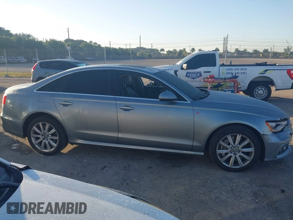 2013 Audi A6 3.0T Prestige with VIN WAUJGAFC6DN131821, listed as a IAAI auction lot 41411463 with 186,380 mi miles. Bid and sale history available at carsss.com. Image 14.