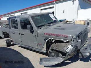 2023 Jeep Gladiator Rubicon with VIN 1C6JJTBG6PL538859, listed as a IAAI auction lot 42633055 with 22,899 mi miles and . Bid and sale history available at DreamBid. Image 14.