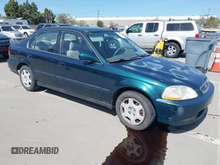 1998 Honda Civic EX with VIN JHMEJ8647WS001024, listed as a IAAI auction lot 41956420 with 198,954 mi miles. Bid and sale history available at carsss.com. Image 1.