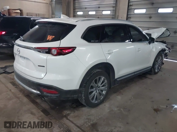 2021 Mazda CX-9 Signature with VIN JM3TCBEY3M0509978, listed as a IAAI auction lot 41690773 with 65,418 mi miles. Bid and sale history available at carsss.com. Image 4.