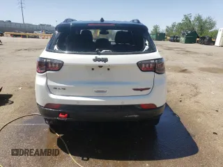 2025 Jeep Compass Trailhawk with VIN 3C4NJDDN2ST533537, listed as a Copart auction lot 61374825 with 8,889 mi miles and Clean title. Bid and sale history available at DreamBid. Image 6.