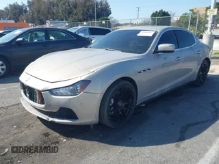 2014 Maserati Ghibli S Q4 z VIN ZAM57RTA8E1095303, wystawiony jako IAAI lot #41600587 z przebiegiem 98 215 mil mil oraz . Historia ofert i sprzedaży dostępna na DreamBid. Obrazek 2.