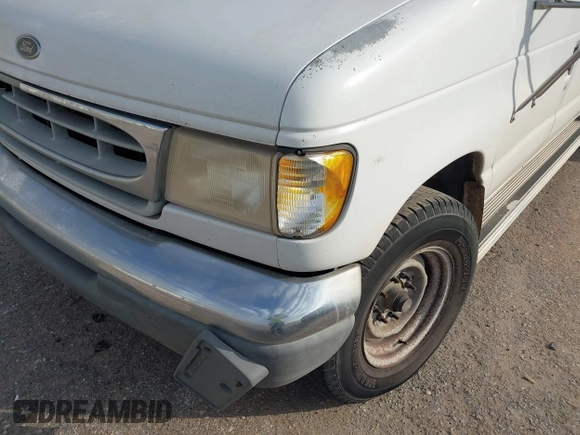 1998 Ford Econoline Wagon XL z VIN 1FBSS31L2WHB12505, wystawiony jako IAAI lot #41067925 z przebiegiem 156 210 mil mil oraz . Historia ofert i sprzedaży dostępna na DreamBid. Obrazek 6.