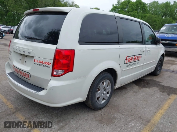 2013 Dodge Grand Caravan SE with VIN 2C4RDGBG8DR505844, listed as a IAAI auction lot 42139152 with 206,399 mi miles and . Bid and sale history available at DreamBid. Image 4.