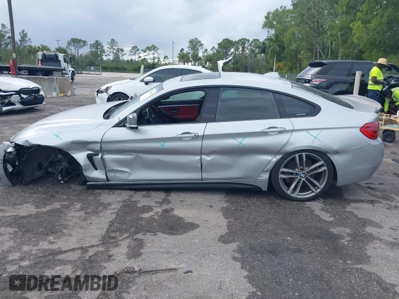 2018 BMW 4 Series 440i with VIN WBA4J5C57JBF07227, listed as a IAAI auction lot 41562986 with 76,316 mi miles and . Bid and sale history available at DreamBid. Image 14.