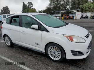 2015 Ford C-Max Energi SEL with VIN 1FADP5CU8FL101583, listed as a Copart auction lot 82705453 with 135,492 mi miles. Bid and sale history available at carsss.com. Image 4.
