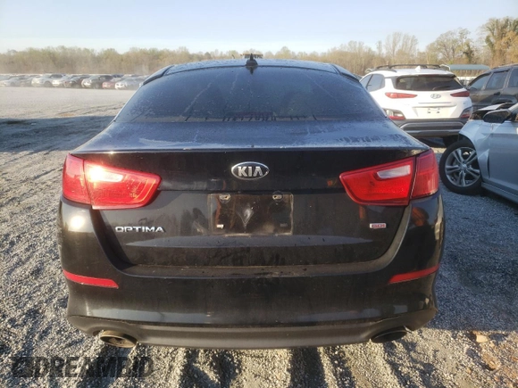 2014 Kia Optima LX z VIN 5XXGM4A71EG277249, wystawiony jako Copart lot #50886935 z przebiegiem 174 002 mil mil oraz Szkoda całkowita • Salvage title. Historia ofert i sprzedaży dostępna na DreamBid. Obrazek 6.