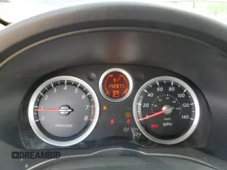 2010 Nissan Sentra S with VIN 3N1AB6AP4AL664046, listed as a Copart auction lot 57210235 with 142,977 mi miles and Salvage title. Bid and sale history available at DreamBid. Image 9.