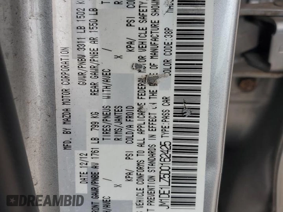 2013 Mazda 2 Touring z VIN JM1DE1LZ5D0162425, wystawiony jako Copart lot #59033595 z przebiegiem 225 932 mil mil oraz Szkoda całkowita • Salvage title. Historia ofert i sprzedaży dostępna na DreamBid. Obrazek 13.