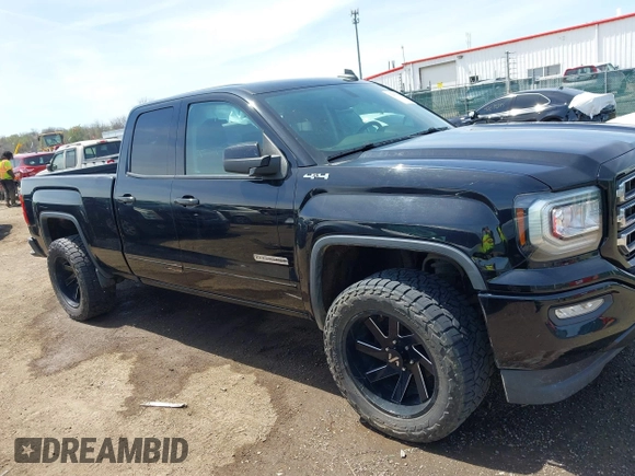 2017 GMC Sierra 1500 SLE z VIN 1GTV2MEC2HZ105964, wystawiony jako IAAI lot #42091941 z przebiegiem 93 779 mil mil oraz . Historia ofert i sprzedaży dostępna na DreamBid. Obrazek 13.