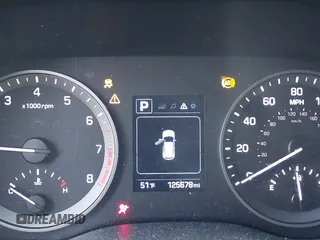 2018 Hyundai Tucson SEL with VIN KM8J33A47JU768935, listed as a IAAI auction lot 41007821 with 125,678 mi miles. Bid and sale history available at carsss.com. Image 7.
