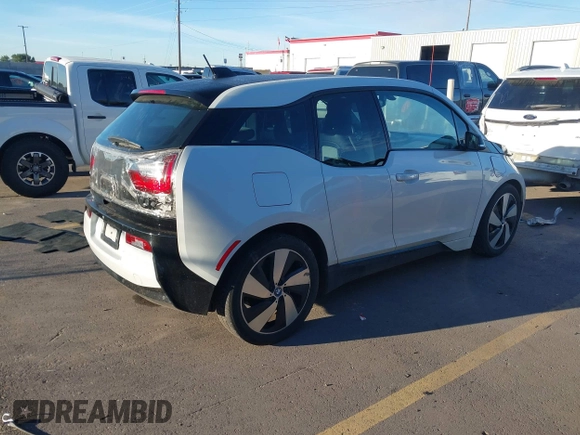 2015 BMW i3 z VIN WBY1Z4C52FV503063, wystawiony jako IAAI lot #40644359 z przebiegiem 77 009 mil mil oraz . Historia ofert i sprzedaży dostępna na DreamBid. Obrazek 4.