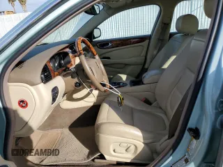 2005 Jaguar XJ with VIN SAJWA79C15SG47018, listed as a Copart auction lot 43087185 with 31,725 mi miles and Salvage Title. Bid and sale history available at carsss.com. Image 7.