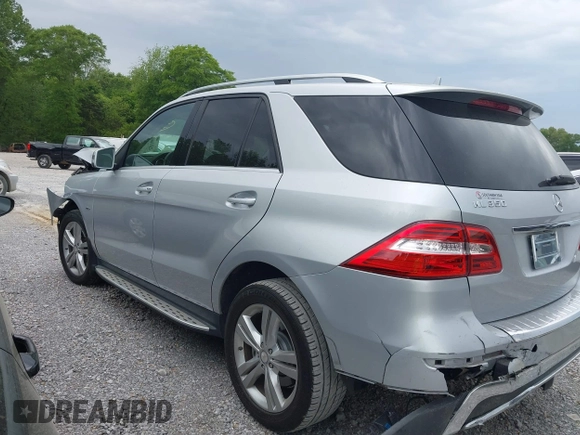2012 Mercedes-Benz M with VIN 4JGDA5HB3CA018357, listed as a IAAI auction lot 42061006 with 130,116 mi miles. Bid and sale history available at carsss.com. Image 14.