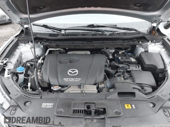 2016 Mazda CX-5 Grand Touring with VIN JM3KE4DY4G0712465, listed as a IAAI auction lot 41859217 with 61,806 mi miles and . Bid and sale history available at carsss.com. Image 10.