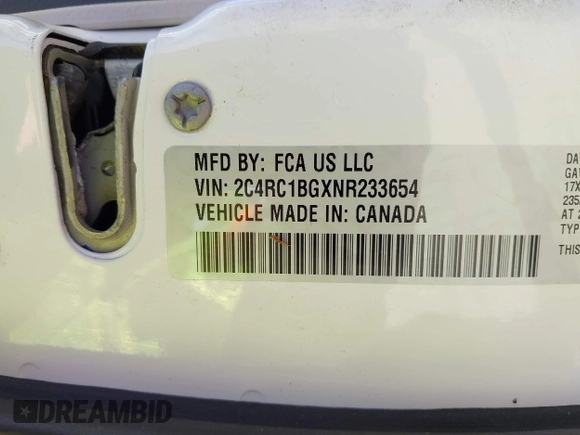 2022 Chrysler Pacifica Touring L with VIN 2C4RC1BGXNR233654, listed as a IAAI auction lot 42137632 with 73,899 mi miles and . Bid and sale history available at DreamBid. Image 9.