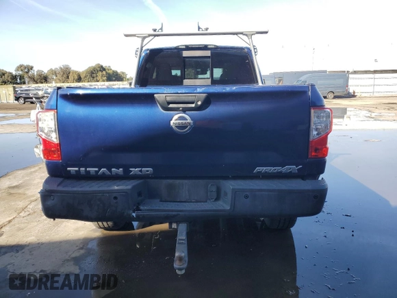 2016 Nissan Titan XD PRO-4X with VIN 1N6BA1F42GN509751, listed as a Copart auction lot 80576664 with 79,037 mi miles and Salvage Title. Bid and sale history available at carsss.com. Image 6.