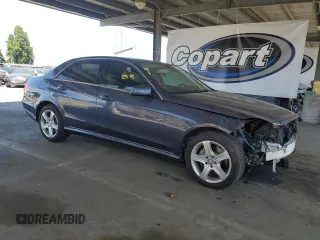 2014 Mercedes-Benz E 350 Sport with VIN WDDHF5KB2EA943012, listed as a Copart auction lot 61136245 with 53,502 mi miles and Salvage title. Bid and sale history available at DreamBid. Image 4.