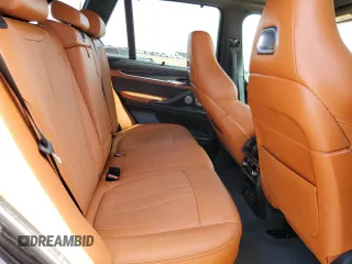 2017 BMW X5 M z VIN 5YMKT6C38H0X20710, wystawiony jako Copart lot #56927285 z przebiegiem 81 524 mil mil oraz Szkody całkowita. Historia ofert i sprzedaży dostępna na DreamBid. Obrazek 11.