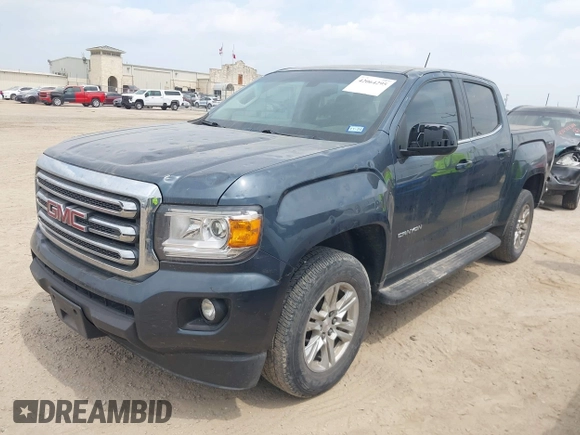 2019 GMC Canyon 4WD SLE z VIN 1GTG6CENXK1261278, wystawiony jako IAAI lot #42064295 z przebiegiem 51 786 mil mil oraz . Historia ofert i sprzedaży dostępna na DreamBid. Obrazek 2.