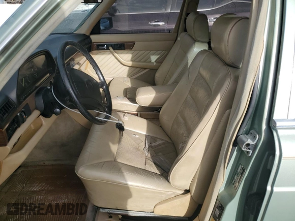 1989 Mercedes-Benz 300 with VIN WDBCA24D0KA457759, listed as a Copart auction lot 47920625 with 174,332 mi miles and Salvage Title. Bid and sale history available at DreamBid. Image 7.