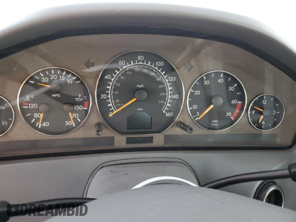 1999 Mercedes-Benz SL-Class with VIN WDBFA68F7XF178125, listed as a Copart auction lot 77404164 with 0 mi miles and Clean Title. Bid and sale history available at carsss.com. Image 9.