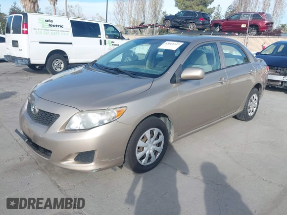2009 Toyota Corolla with VIN 1NXBU40EX9Z065469, listed as a IAAI auction lot 42022537 with 179,819 mi miles. Bid and sale history available at carsss.com. Image 2.