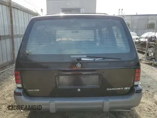 1991 Dodge Caravan z VIN 2B4GK55R6MR136865, wystawiony jako Copart lot #83209824 z przebiegiem 44 931 mil mil oraz Tytuł czysty. Historia ofert i sprzedaży dostępna na DreamBid. Obrazek 6.