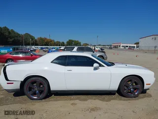 2013 Dodge Challenger SXT with VIN 2C3CDYAG6DH737253, listed as a IAAI auction lot 40615411 with 133,973 mi miles. Bid and sale history available at carsss.com. Image 13.