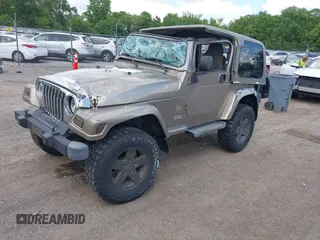 2004 Jeep Wrangler Sahara with VIN 1J4FA59S54P740417, listed as a IAAI auction lot 42382078 with 200,108 mi miles and . Bid and sale history available at DreamBid. Image 18.