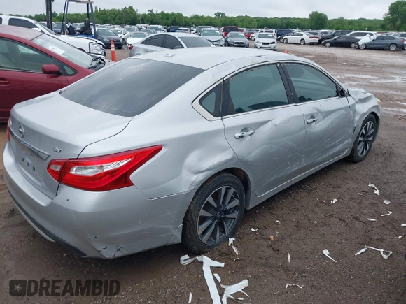 2016 Nissan Altima SR with VIN 1N4AL3AP9GC197161, listed as a IAAI auction lot 42147833 with 135,700 mi miles and . Bid and sale history available at DreamBid. Image 4.
