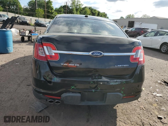 2012 Ford Taurus Limited z VIN 1FAHP2FW6CG136463, wystawiony jako Copart lot #57159005 z przebiegiem 124 833 mil mil oraz Szkoda całkowita • Salvage title. Historia ofert i sprzedaży dostępna na DreamBid. Obrazek 6.