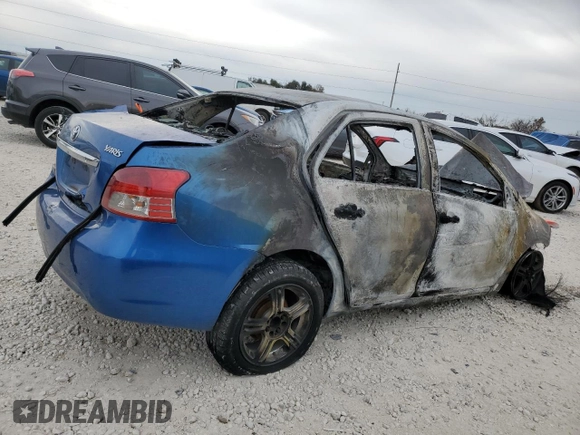 2009 Toyota Yaris with VIN JTDBT903794055243, listed as a Copart auction lot 88719525 with Not Provided miles and Non Repairable. Bid and sale history available at DreamBid. Image 3.