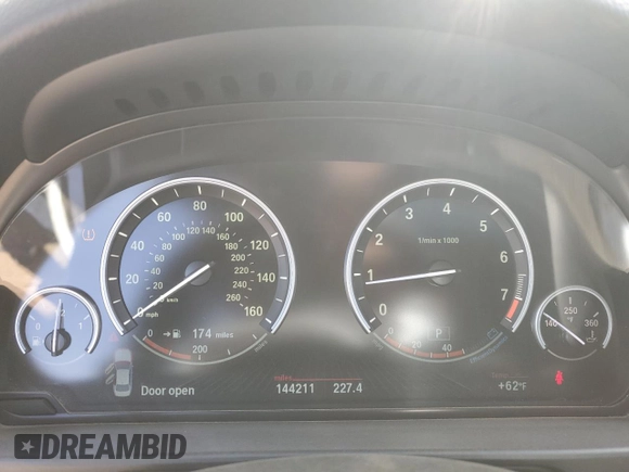 2013 BMW 5 Series 550i xDrive with VIN WBAFU9C52DDY71651, listed as a Copart auction lot 52156465 with 144,211 mi miles and Salvage title. Bid and sale history available at DreamBid. Image 9.