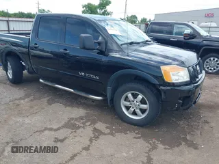 2012 Nissan Titan SV with VIN 1N6BA0EC8CN308076, listed as a IAAI auction lot 42302724 with 164,138 mi miles and . Bid and sale history available at DreamBid. Image 1.
