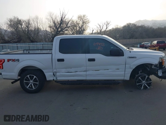 2019 Ford F-150 XL with VIN 1FTEW1EP8KKE13811, listed as a IAAI auction lot 41769452 with 133,146 mi miles and . Bid and sale history available at DreamBid. Image 13.