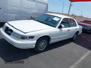 1996 Mercury Grand Marquis GS with VIN 2MELM74WXTX650841, listed as a IAAI auction lot 41936608 with 205,964 mi miles and . Bid and sale history available at DreamBid. Image 12.