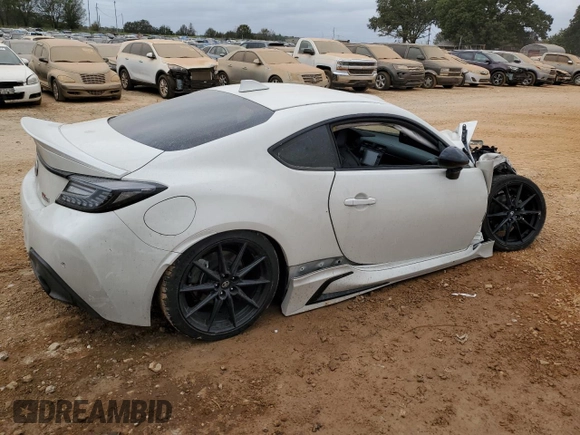2023 Toyota GR86 Premium with VIN JF1ZNBF13P8764737, listed as a Copart auction lot 77890194 with 0 mi miles and Salvage Title. Bid and sale history available at carsss.com. Image 3.