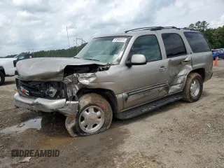 2002 GMC Yukon SLT with VIN 1GKEC13Z22R158811, listed as a Copart auction lot 74568464 with 0 mi miles and Salvage Title. Bid and sale history available at carsss.com. Image 1.