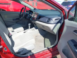 2010 Honda Insight EX with VIN JHMZE2H78AS032088, listed as a IAAI auction lot 41694387 with 145,776 mi miles and . Bid and sale history available at DreamBid. Image 5.