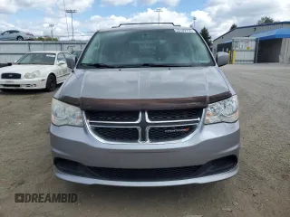 2014 Dodge Grand Caravan SXT with VIN 2C4RDGCG7ER141867, listed as a Copart auction lot 53187715 with 231,414 mi miles and Clean Title. Bid and sale history available at DreamBid. Image 5.