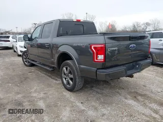 2015 Ford F-150 XLT with VIN 1FTEW1EG8FFC72205, listed as a IAAI auction lot 41971267 with 166,068 mi miles. Bid and sale history available at carsss.com. Image 3.