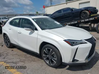 2022 Lexus UX 200 z VIN JTHP3JBH8N2055563, wystawiony jako IAAI lot #42462891 z przebiegiem 25 828 mil mil oraz . Historia ofert i sprzedaży dostępna na DreamBid. Obrazek 13.