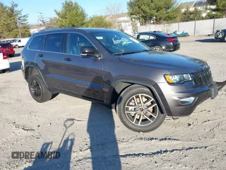 2021 Jeep Grand Cherokee 80th Anniversary z VIN 1C4RJFBG5MC737412, wystawiony jako IAAI lot #41753550 z przebiegiem 54 921 mil mil oraz . Historia ofert i sprzedaży dostępna na DreamBid. Obrazek 1.