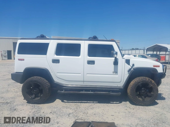 2003 Hummer H2 z VIN 5GRGN23U53H102215, wystawiony jako IAAI lot #42054023 z przebiegiem 222 170 mil mil oraz . Historia ofert i sprzedaży dostępna na DreamBid. Obrazek 13.